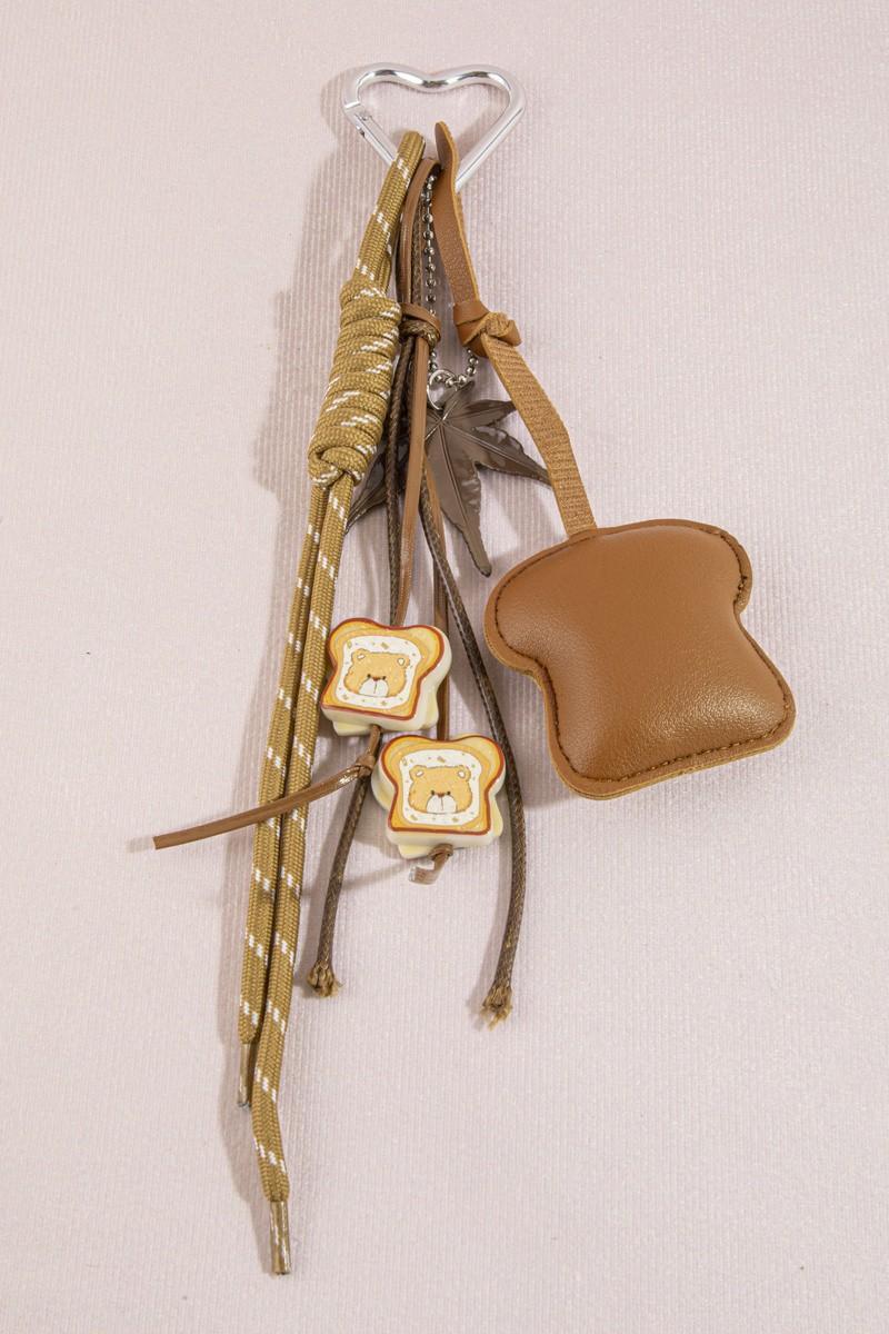 Smiley Toast & Maple Leaf Bag Charm